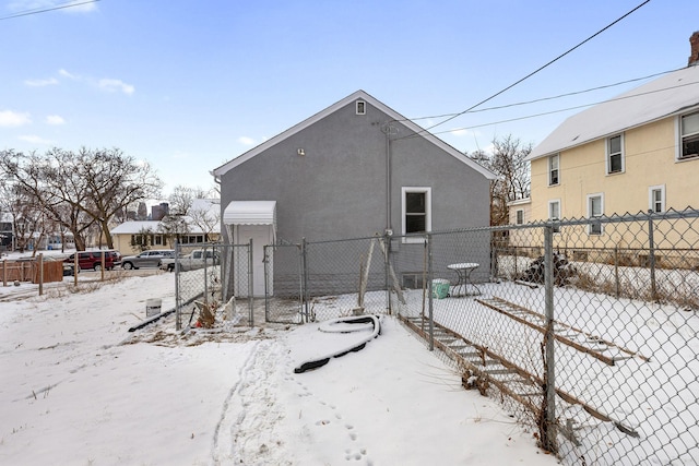 view of snow covered house