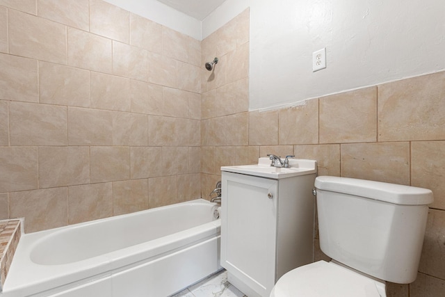 full bathroom with toilet, tile walls, tiled shower / bath, and vanity