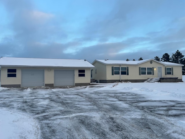 view of front of home with a garage