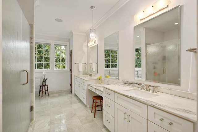 bathroom featuring an enclosed shower, vanity, and crown molding