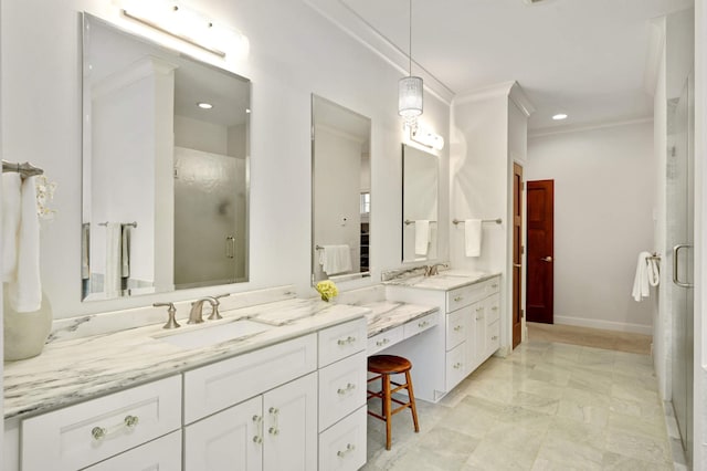 bathroom featuring crown molding, a shower with shower door, and vanity