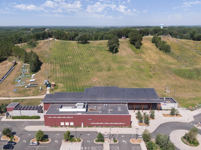 birds eye view of property with a rural view