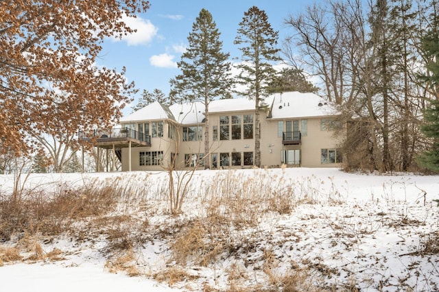 view of snow covered house