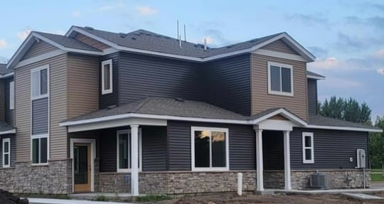 view of front of property with central air condition unit