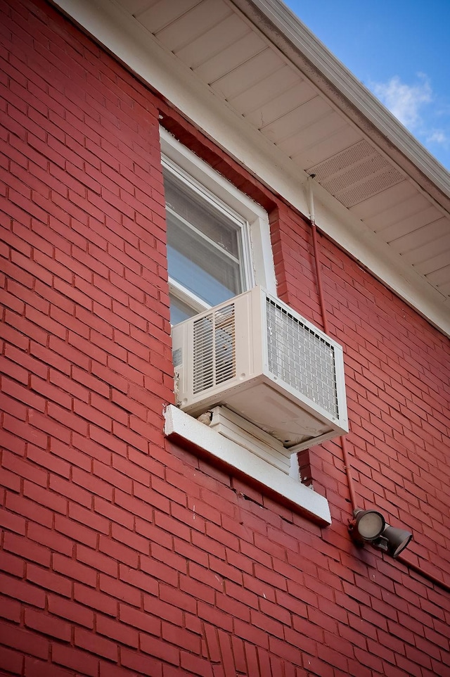 view of side of property featuring a balcony