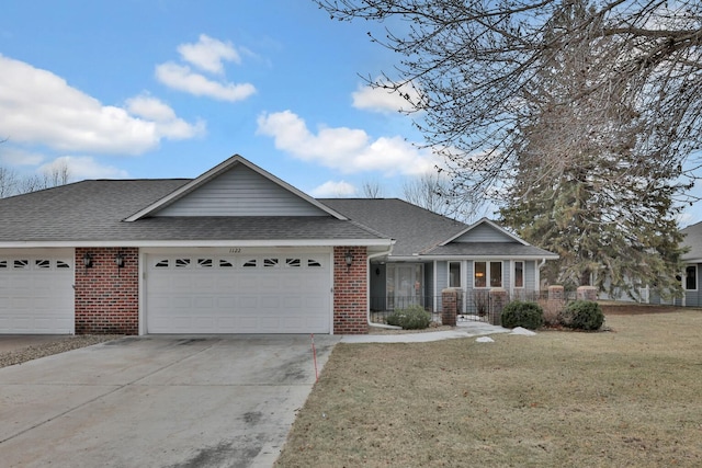 single story home with a front lawn and a garage