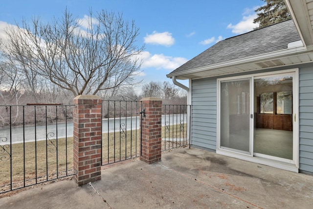 view of patio / terrace featuring a water view