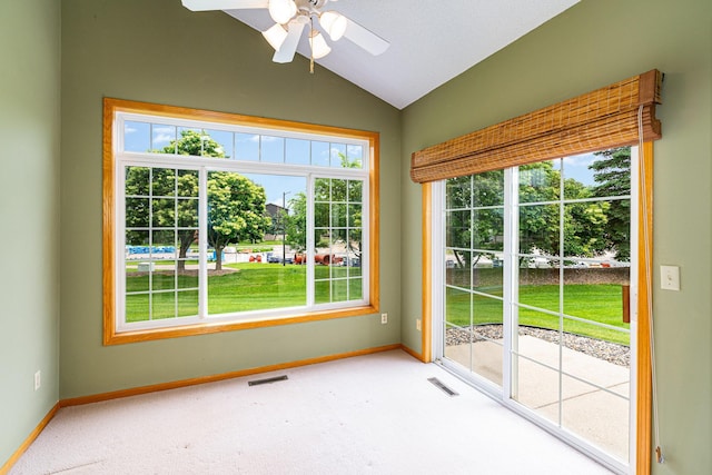 2695 Oak Ridge Trl, Woodbury, MN 55125 - unfurnished room featuring carpet flooring, vaulted ceiling, and a ceiling fan
