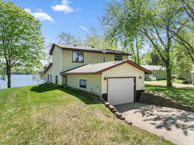 7364 Isaak Ave NW, Annandale, MN 55302 - view of front of home with driveway, a water view, and a front yard