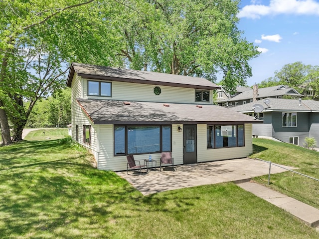 7364 Isaak Ave NW, Annandale, MN 55302 - rear view of house featuring a patio area and a yard