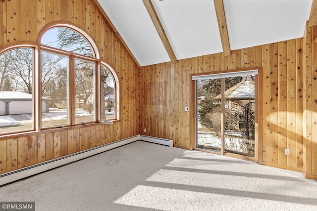 carpeted spare room featuring vaulted ceiling with beams, a baseboard heating unit, and wooden walls