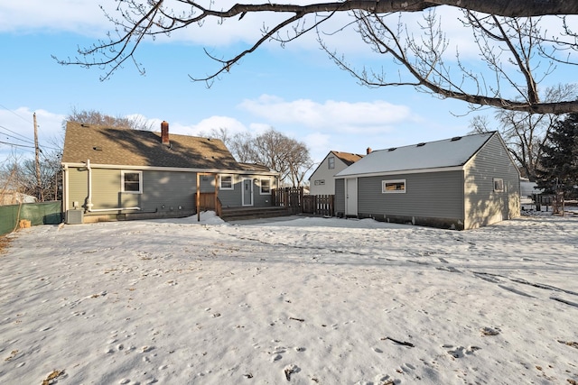 view of snow covered house