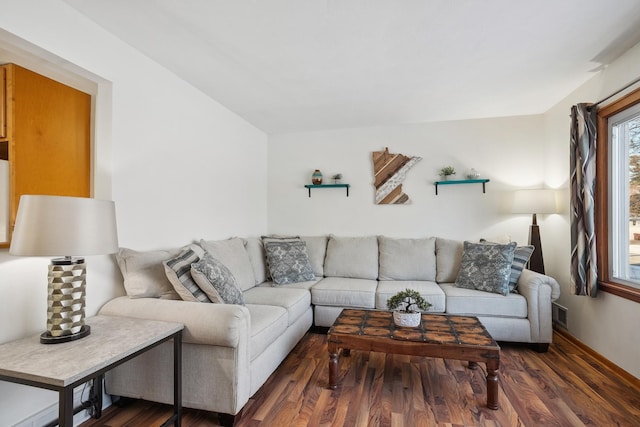 living room with dark hardwood / wood-style flooring