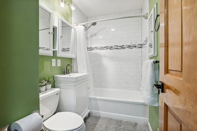 full bathroom featuring sink, tile patterned floors, toilet, and shower / bath combo