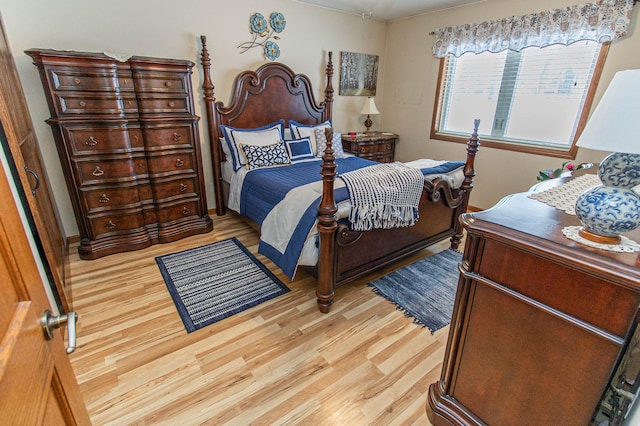 bedroom with light hardwood / wood-style floors