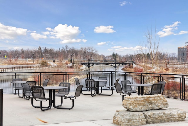 view of patio / terrace featuring a water view