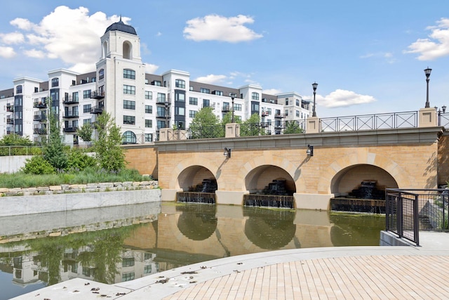 view of building exterior with a water view