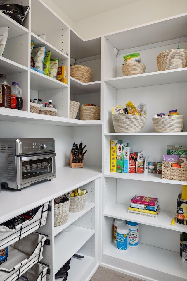 storage area featuring a toaster