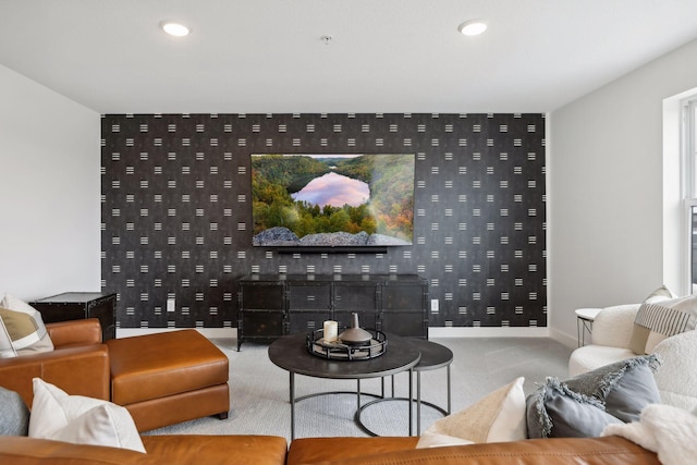 living area with carpet flooring, baseboards, and recessed lighting