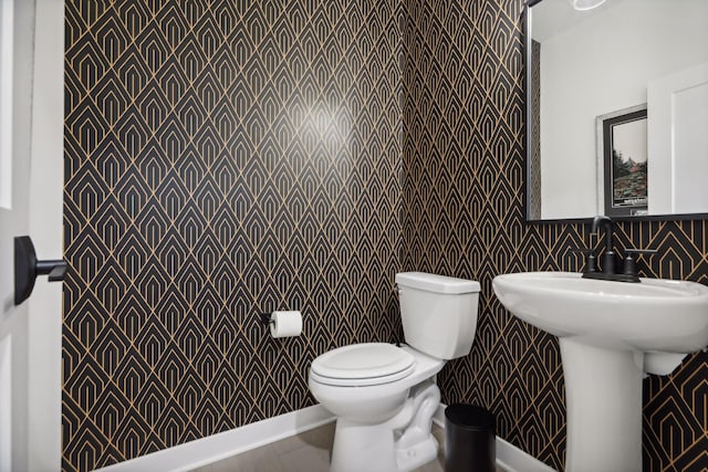 bathroom featuring toilet