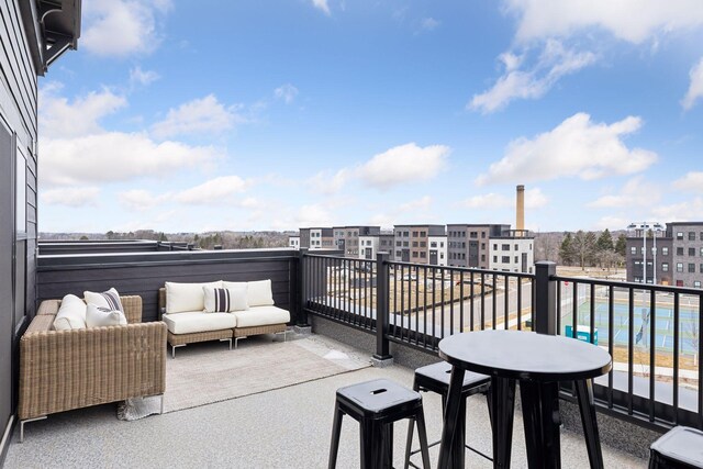 balcony featuring outdoor lounge area