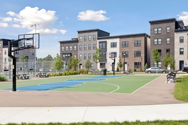 view of sport court with community basketball court and fence