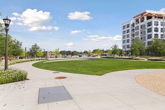 surrounding community featuring a lawn