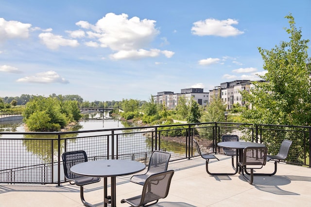 view of patio / terrace featuring a water view