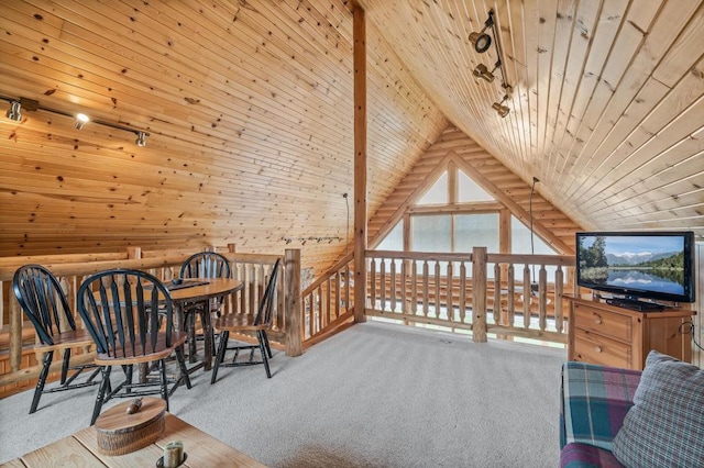 living area with wooden ceiling, lofted ceiling, light colored carpet, and wooden walls