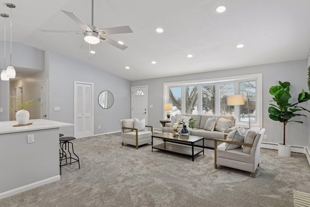 carpeted living room featuring vaulted ceiling and ceiling fan