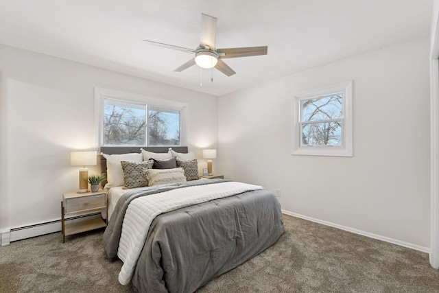 bedroom with ceiling fan, carpet, and a baseboard radiator