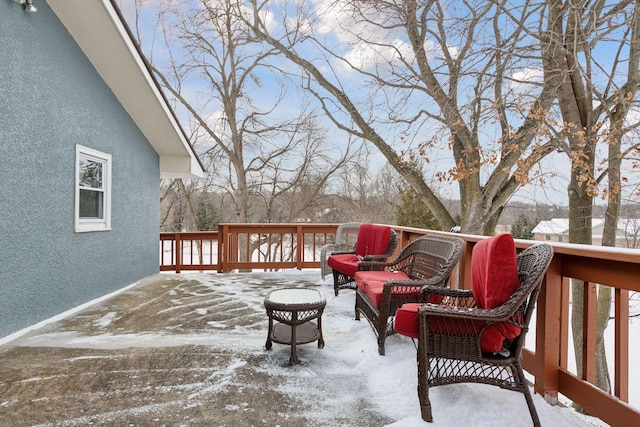 view of snow covered deck