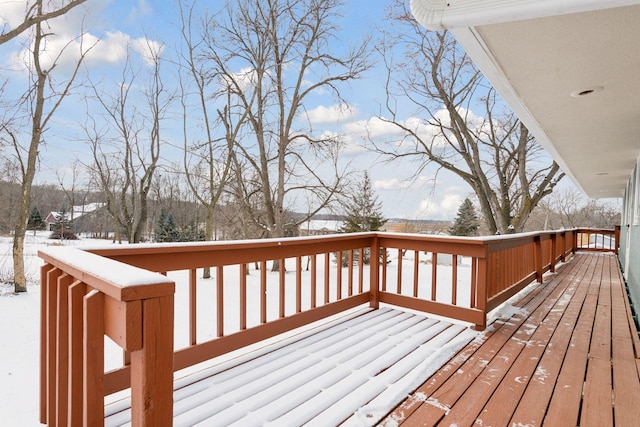 view of snow covered deck