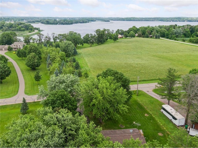 birds eye view of property featuring a rural view and a water view