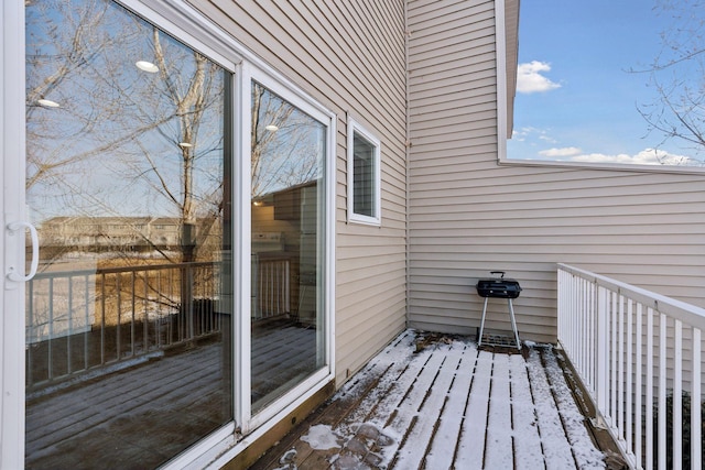 view of snow covered deck