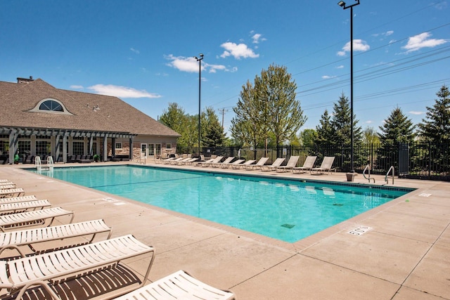 view of pool featuring a patio area