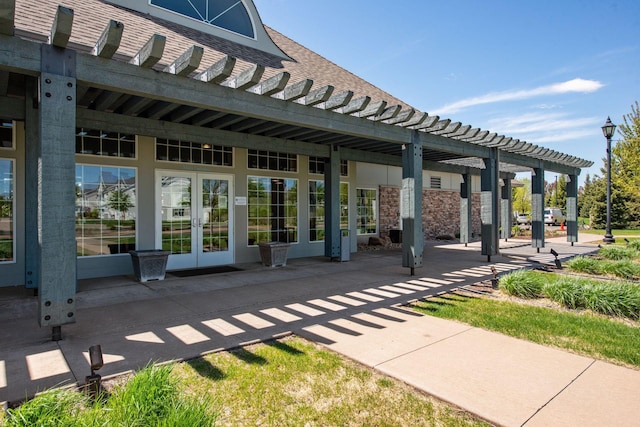 view of patio / terrace featuring a pergola and french doors