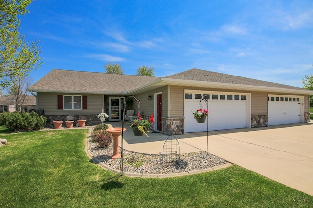 1406 Elsie Dr, Glencoe, MN 55336 - ranch-style house with stone siding, a garage, driveway, and a front yard