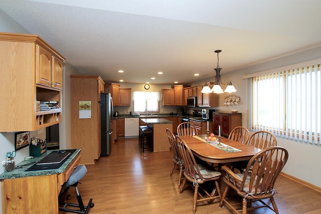 1406 Elsie Dr, Glencoe, MN 55336 - dining area with light wood-style floors and recessed lighting