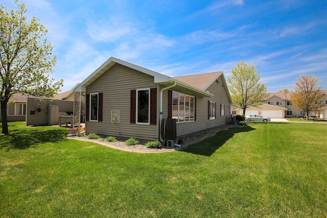 1406 Elsie Dr, Glencoe, MN 55336 - view of home's exterior with a yard