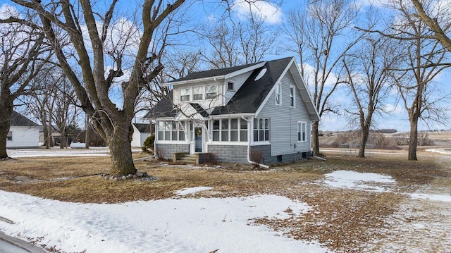 view of front facade featuring a sunroom