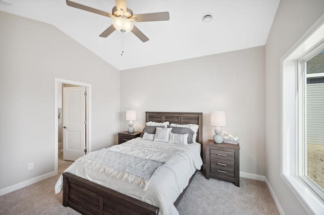 carpeted bedroom featuring ceiling fan and lofted ceiling