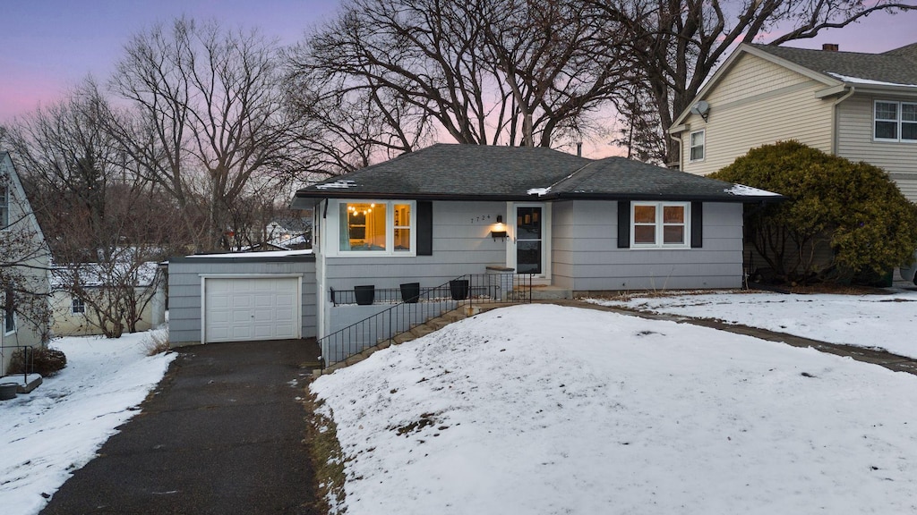 view of front of house with a garage