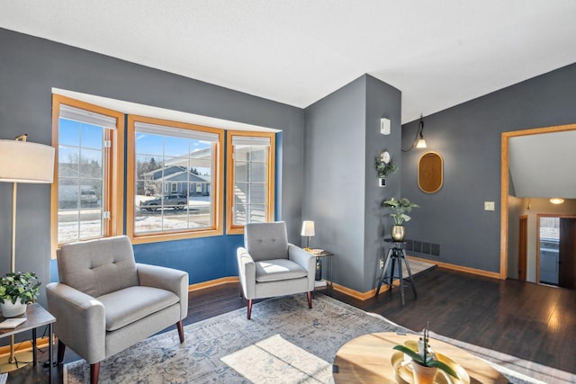 living area featuring hardwood / wood-style floors