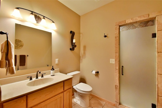 bathroom featuring walk in shower, tile patterned floors, toilet, and vanity