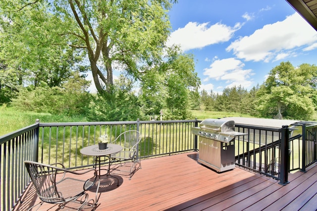 wooden deck with area for grilling