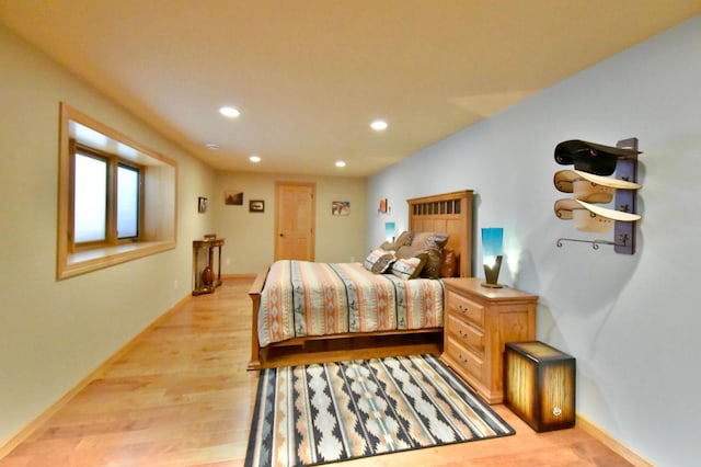 bedroom with light hardwood / wood-style flooring