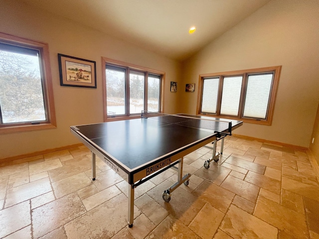 recreation room with vaulted ceiling