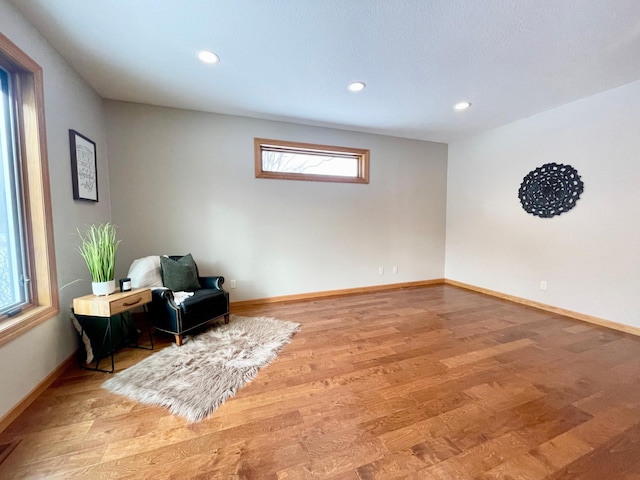 sitting room with light wood-type flooring