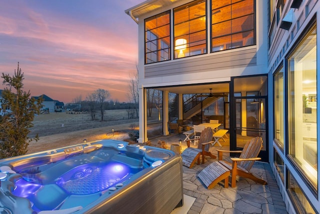 view of patio / terrace featuring a hot tub